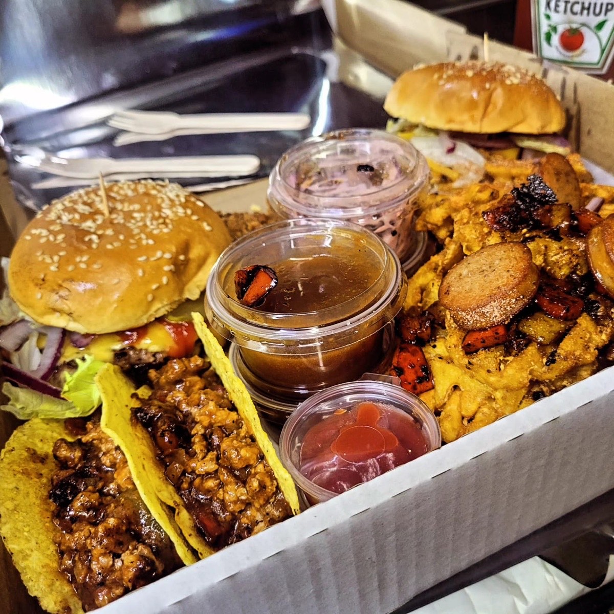 Burgerhain Full Panda Box with gourmet burgers, beef tacos, loaded fries and dips in a sharing box